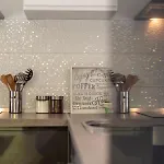 Ela *